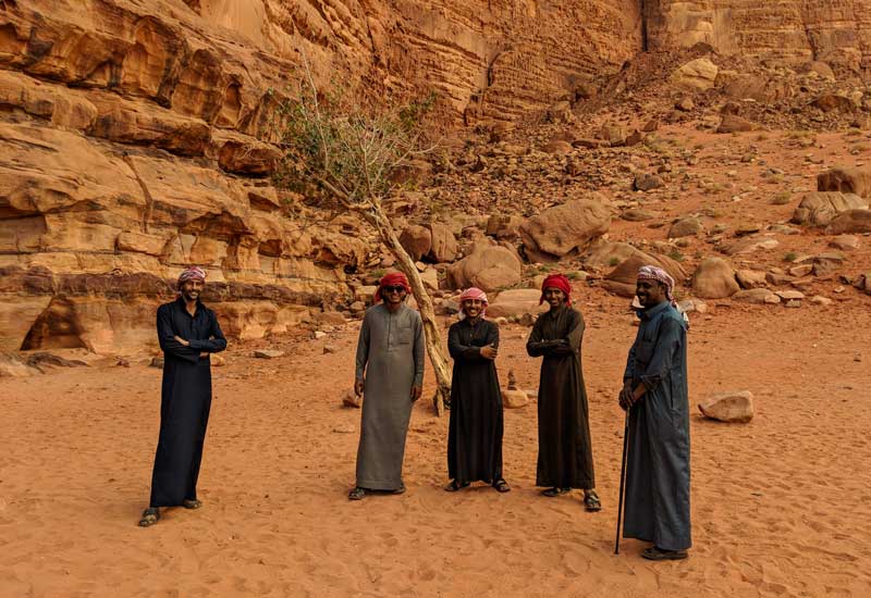 Local Bedouin guides in Wadi Rum smiling for the camera