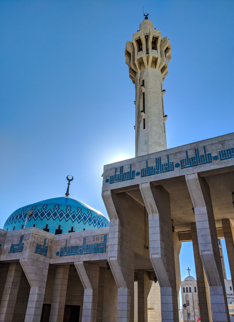 The King Hussein Blue Mosque of Amman with catholic church in ba