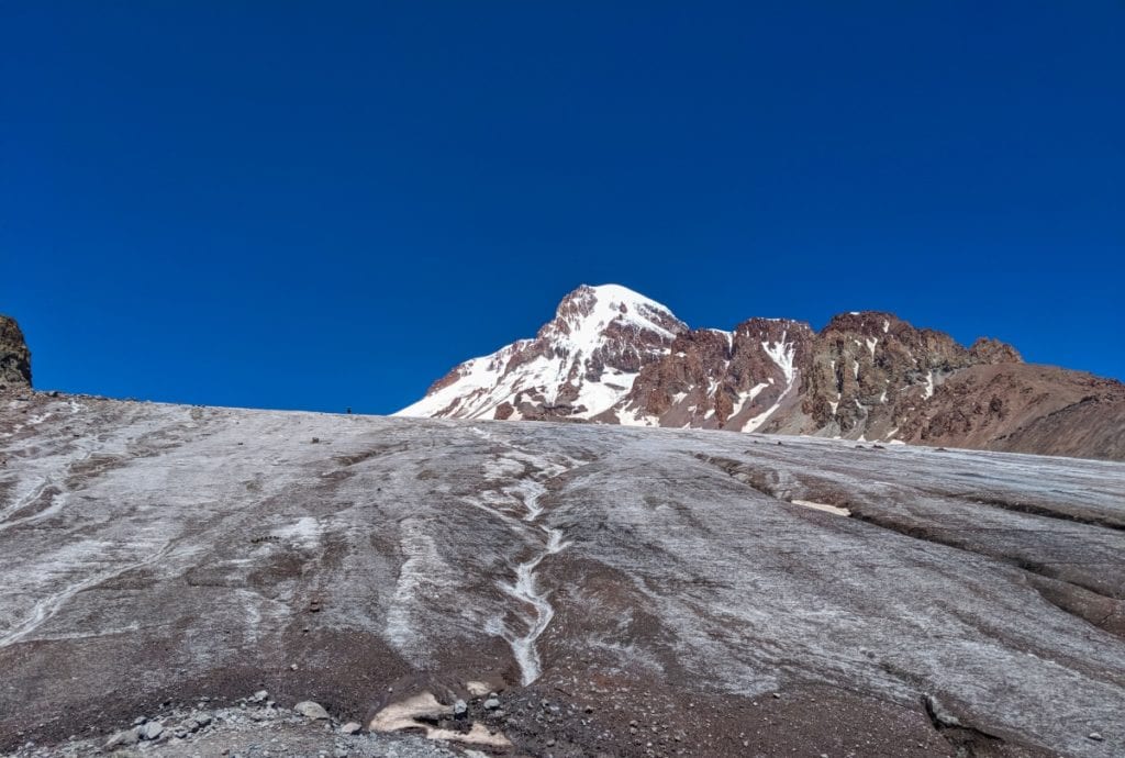 glacier with mount kazbegi in distance
