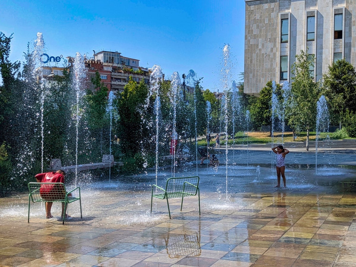 cooling off in summer in skanderbeg square